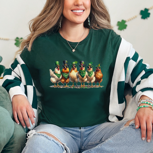 Forest green St. Patrick’s Day graphic tee featuring a row of festive chickens wearing leprechaun hats and green accessories.