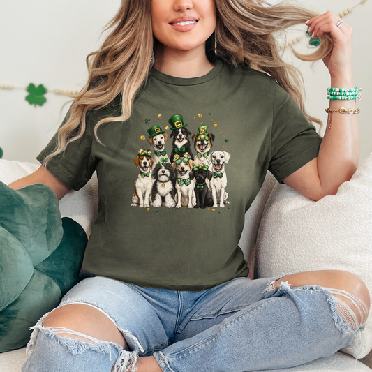 Army green tee featuring an adorable lineup of dogs wearing festive St. Patrick’s Day accessories, including leprechaun hats, bow ties, and shamrocks. A perfect design to bring some Irish charm to your wardrobe.